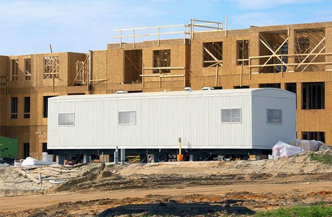 construction workers meeting at office trailers on rent in Chino, CA